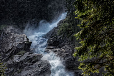 Scenic view of waterfall in forest