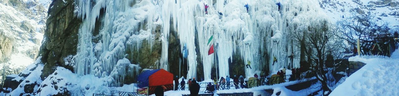 PANORAMIC VIEW OF PEOPLE ON SNOW