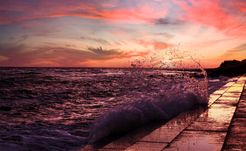 Scenic view of sea against sky during sunset