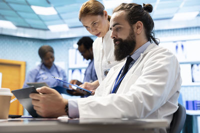Doctor examining patient at clinic