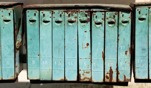 Close-up of rusty post boxes 