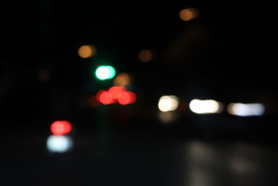 Defocused image of illuminated lights at night