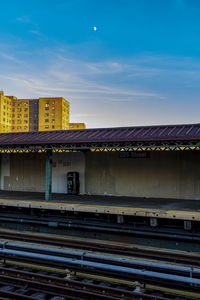 Elevated subway and moon rise