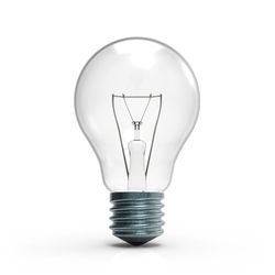 Close-up of light bulb against white background