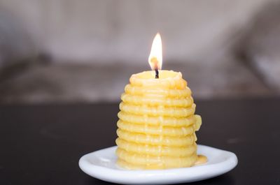 Close-up of burning candle