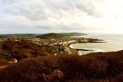 High angle view of bay against sky