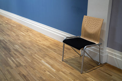 High angle view of empty chairs on table at home