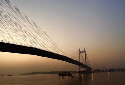 View of suspension bridge over river