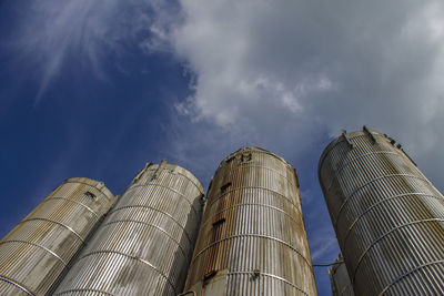 Low angle view of building against cloudy sky