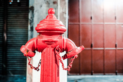 Close-up of fire hydrant against building