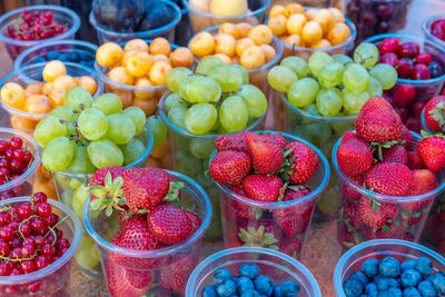 Various fruits for sale at market stall