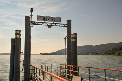 Lake maggiore from the pier of baveno city with the pescatori isle and the coast in the background 