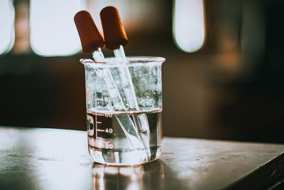 Close-up of water in glass on table