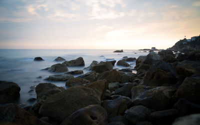 Scenic view of sea at sunset