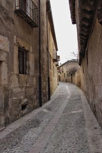 Narrow alley along buildings