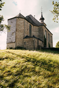 Exterior of historic building against sky