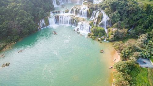 High angle view of waterfall in the forest