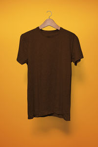 Built structure hanging against orange background