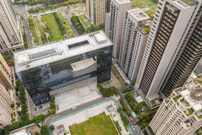 High angle view of street amidst buildings in city