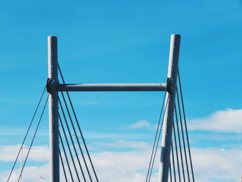 Metallic structure against blue sky