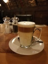 Close-up of coffee cup on table