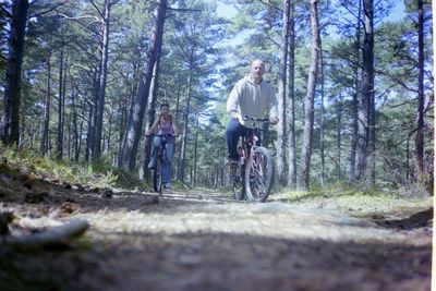 Woman standing in forest