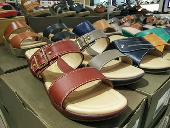 High angle view of various shoes for sale