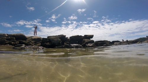 Scenic view of beach against sky