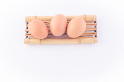 Directly above shot of wood against white background