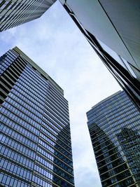 Low angle view of modern buildings against sky