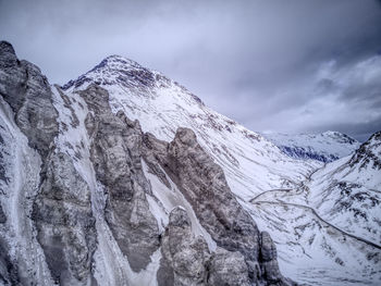 Scenic view of snow mountains against sky