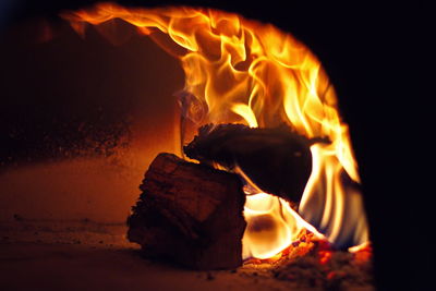 Close-up of fire burning in the dark