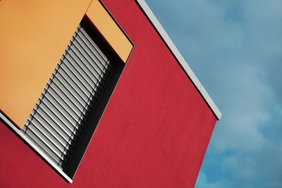 Low angle view of modern building against sky