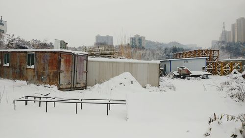 Panoramic view of city against clear sky during winter