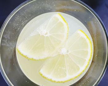 High angle view of lemon in glass