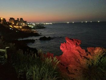 Scenic view of sea at sunset