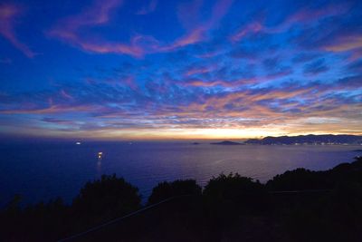 Scenic view of sea against sky at sunset