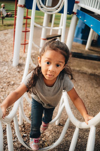 High angle view of girl playing at playground