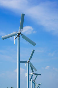 Low angle view of wind turbine against sky