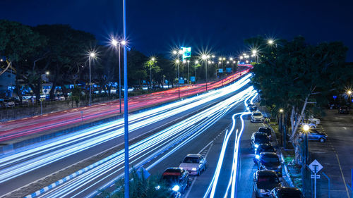 High angle view of light trails on street at night