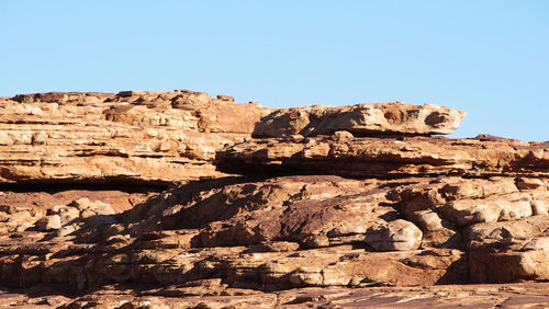 Rock formation against clear sky