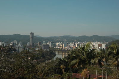 Cityscape against clear sky