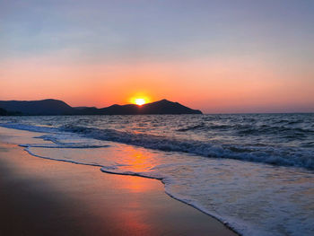 Scenic view of sea against sky during sunset