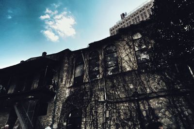 Low angle view of old building against sky