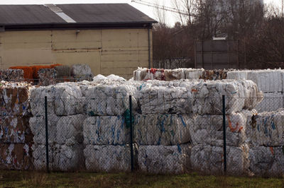 Stack of garbage against building