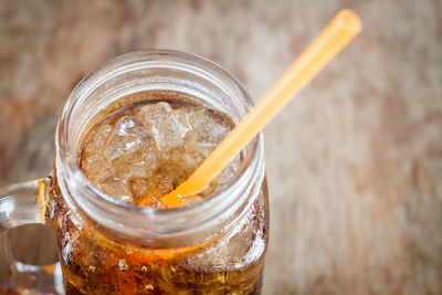 Close-up of drink in jar on table