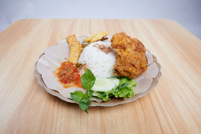 Close-up of food in plate on table