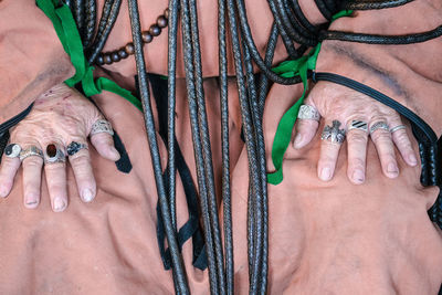 High angle view of woman hand with graffiti