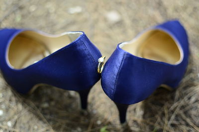 High angle view of shoes on sand