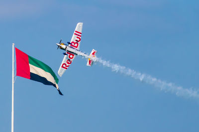 Low angle view of flag against sky